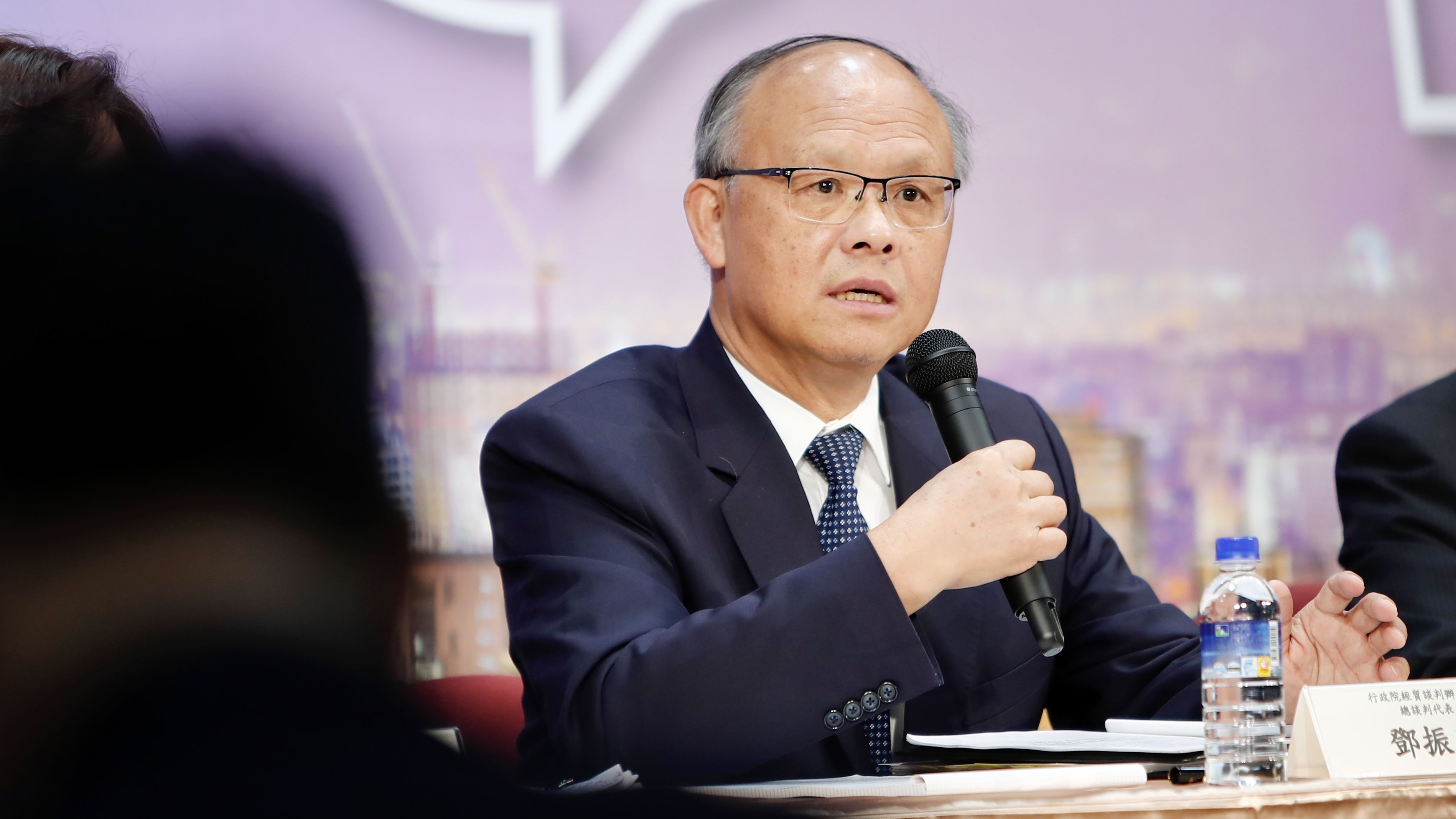 John Deng, minister without portfolio, speaks to the media in Taipei.