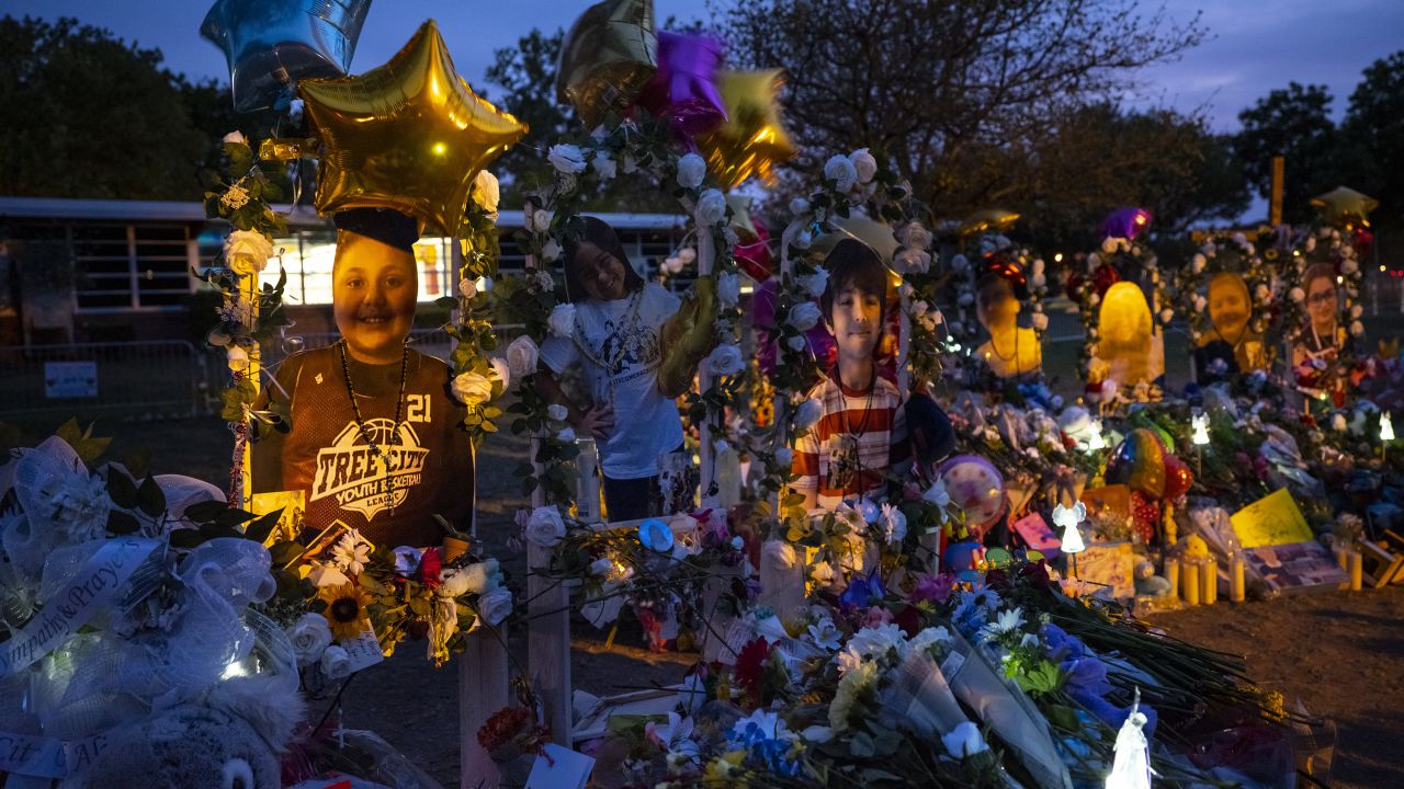 Enlarged photographs have been made into memorials to the 19 children and two teachers who died at Robb Elementary School in Uvalde, Texas, last week. The children shown from left are: Eliahna "Ellie" Amyah Garcia, 9, Amerie Jo Garza, 10, and Uziyah Garcia, 10.