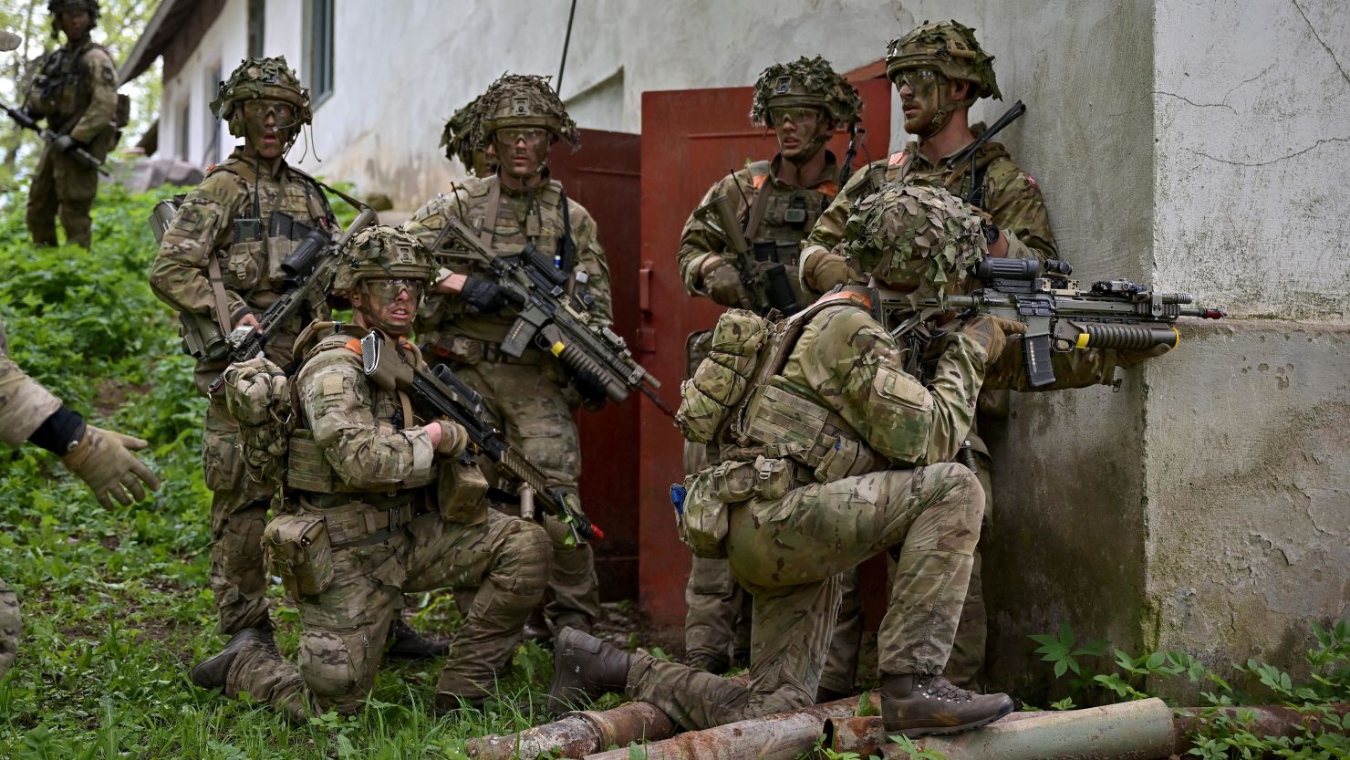 Danish soldiers take part in a NATO exercise on the Estonian-Latvian border on May 25, 2022. 