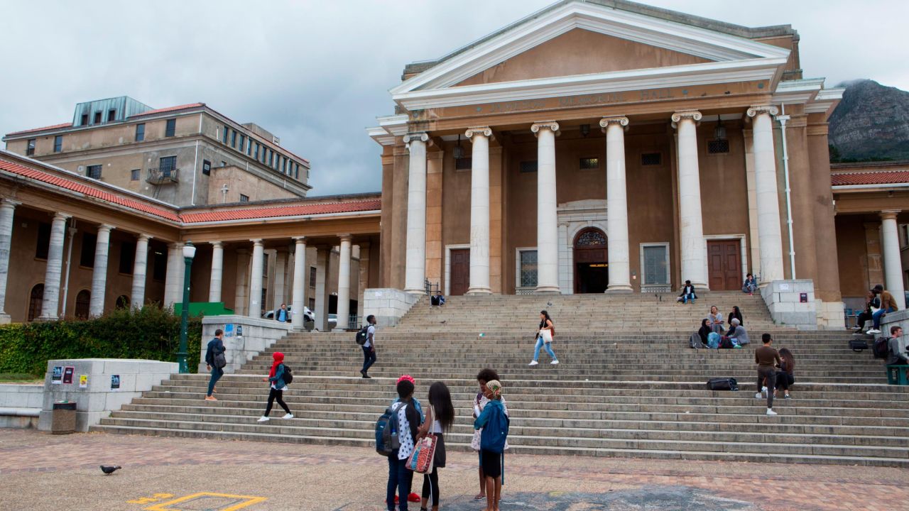 Students hang out on campus at the University of Cape Town, a public research university, on March 6, 2018 in Cape Town, South Africa.