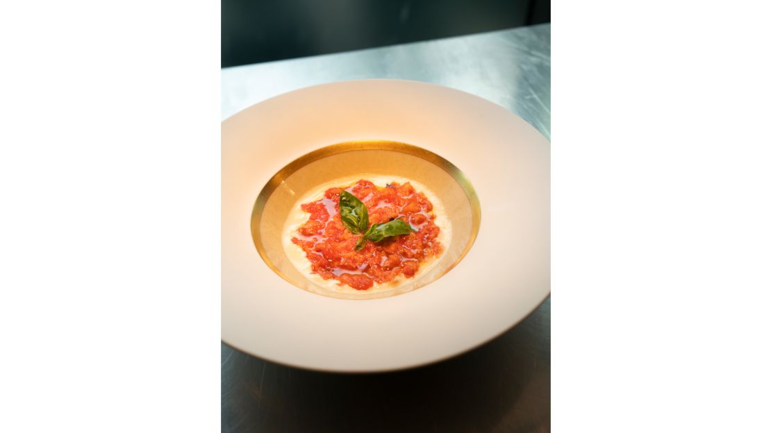 Chef Enrico Bartolini has added pappa al pomodoro to the business class menu.