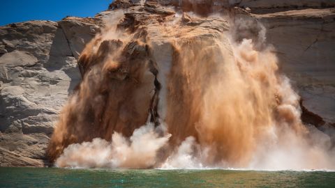 A rockfall crashes into Lake Powell, the second-largest reservoir in the country, on Memorial Day.