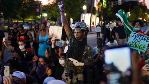 A protester raises his fist during a demonstration on May 31, 2020, in Atlanta in the wake of George Floyd's death. 