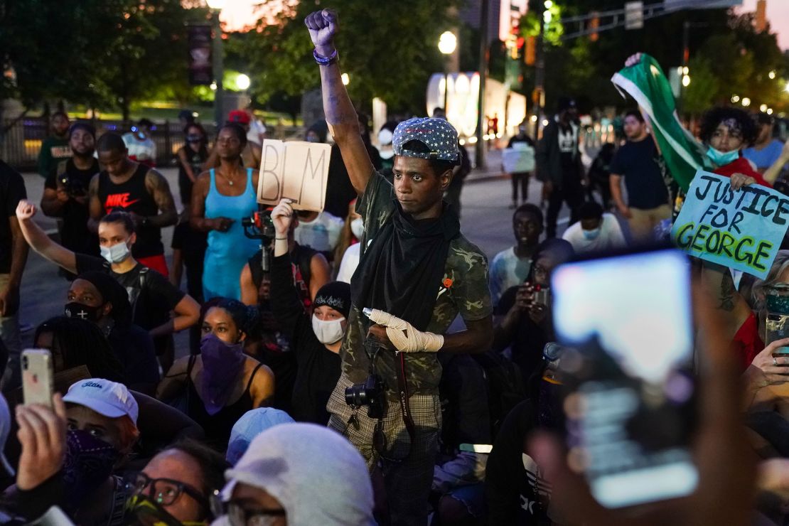 A protester raises his fist during a demonstration on May 31, 2020, in Atlanta in the wake of George Floyd's death. 