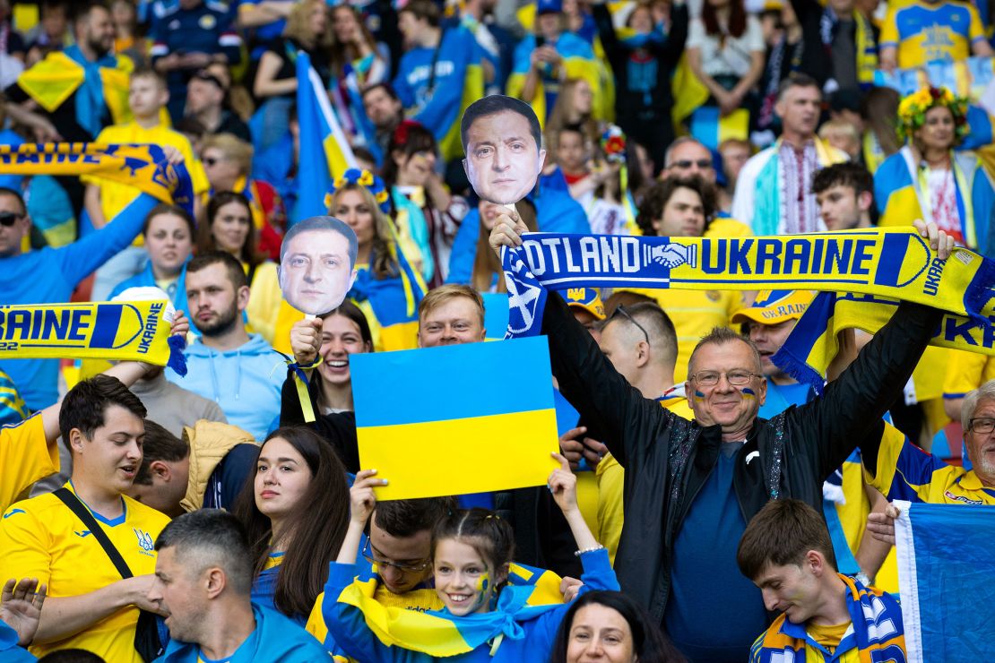 Ukraine Fans with masks of President Volodymyr Zelensky during the World Cup playoff semifinal.