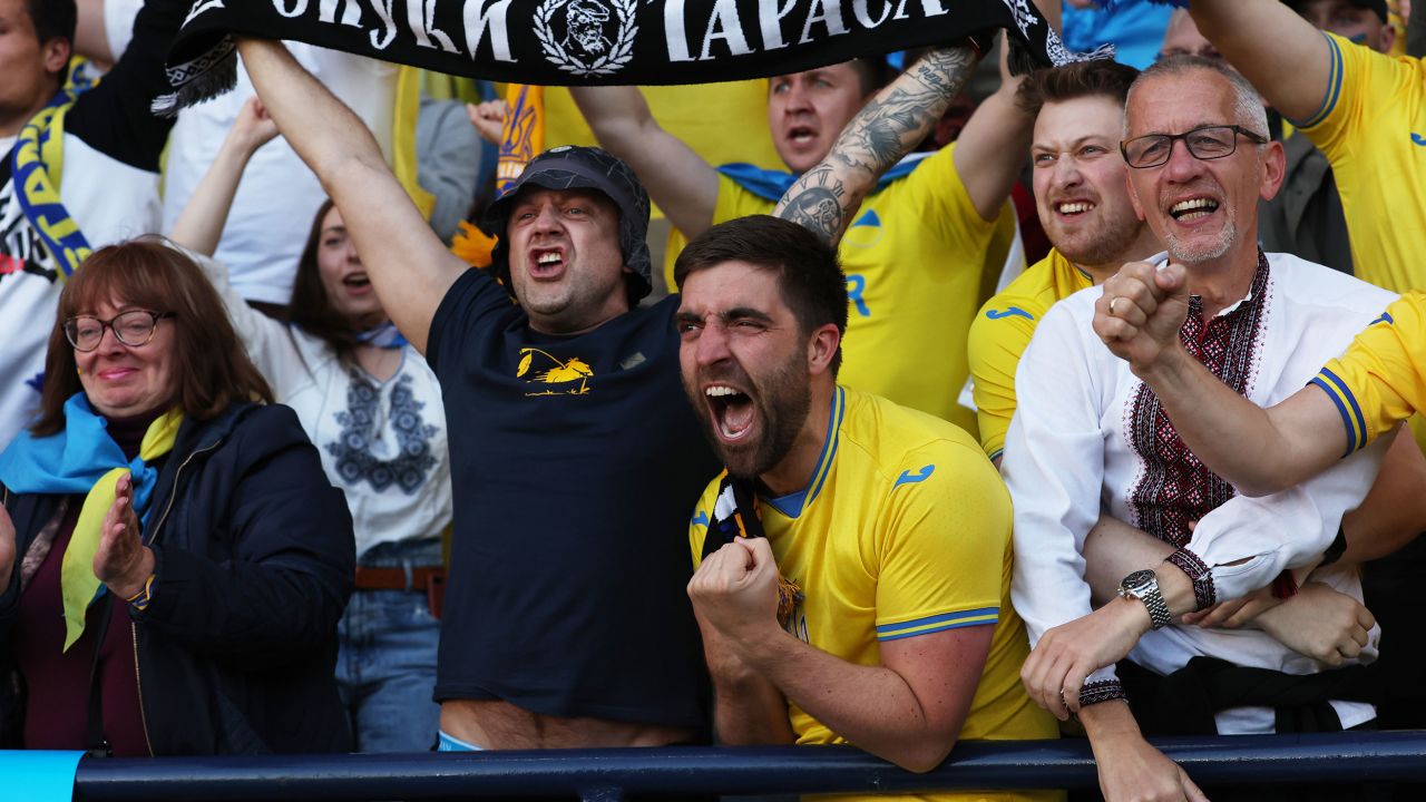 Ukrainian fans celebrate after Andriy Yarmolenko's goal had given Ukraine the lead.