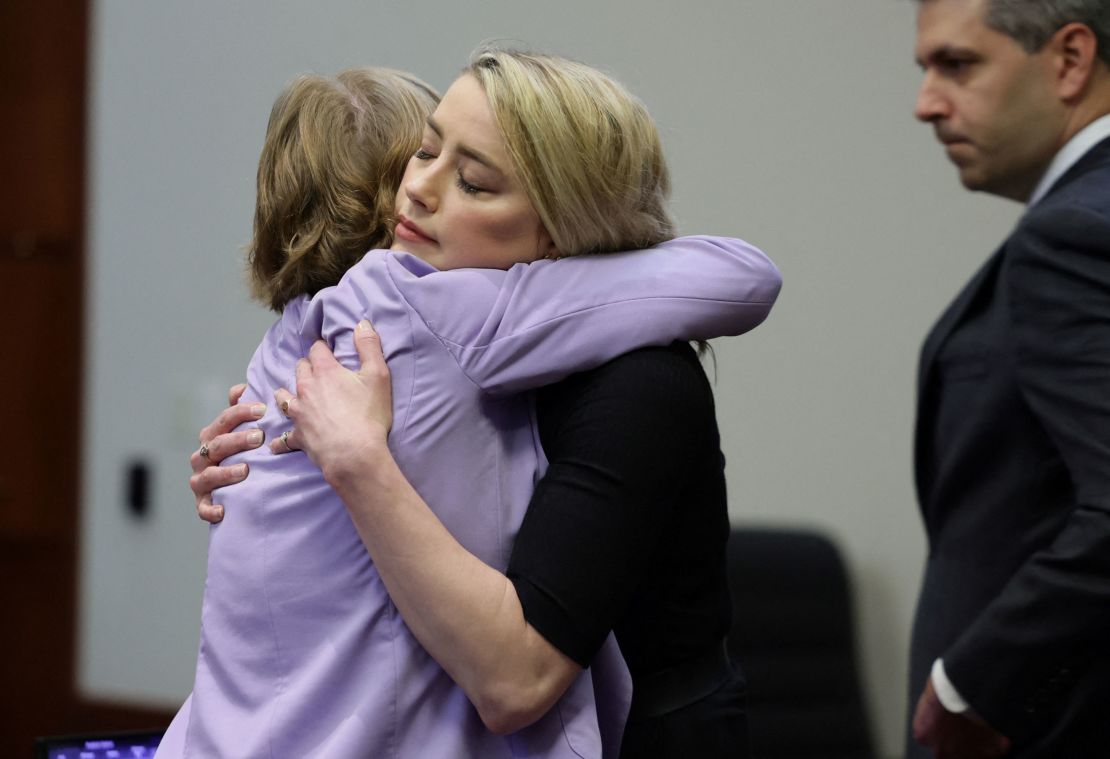 Amber Heard hugs her lawyer Elaine Bredehoft after the verdict.