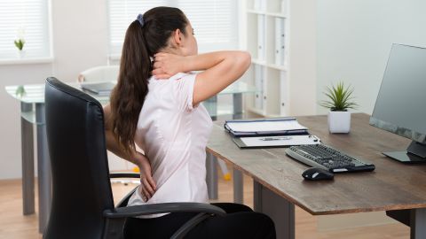 For low back pain relief, proactive techniques are more effective than passive approaches, explains fitness expert Dana Santas.