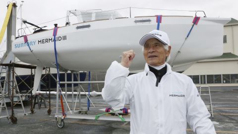 83-year-old ocean adventurer Kenichi Horie, who will try sail a yacht single-handed at the Pacific Ocean for the first time in 60 years, speaks to media at Shin Nishinomiya Yacht Harbor in Nishinomiya City, Hyogo Prefecture on January 24, 2022. His yacht named "SUNTORY MERMAID Ⅲ" is loaded on a trailer to carry it to the starting point, San Francisco, USA, and will depart on March 26th. Horie succeeded in crossing the Pacific Ocean for the first time in the world in 1962, when he was 23 years old, over 94 days. This time he will follow the opposite route, aiming to return in about three months. If successful, it will be the oldest achievement in the world. The yacht is 5.83-meter- length same as the first Mermaid that made the first voyage. The first generation was made of plywood, but this time aluminum plate is used. Solar panels provide the power required for radio and lamps. ( The Yomiuri Shimbun via AP Images )