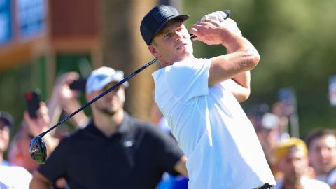 Brady plays a shot.