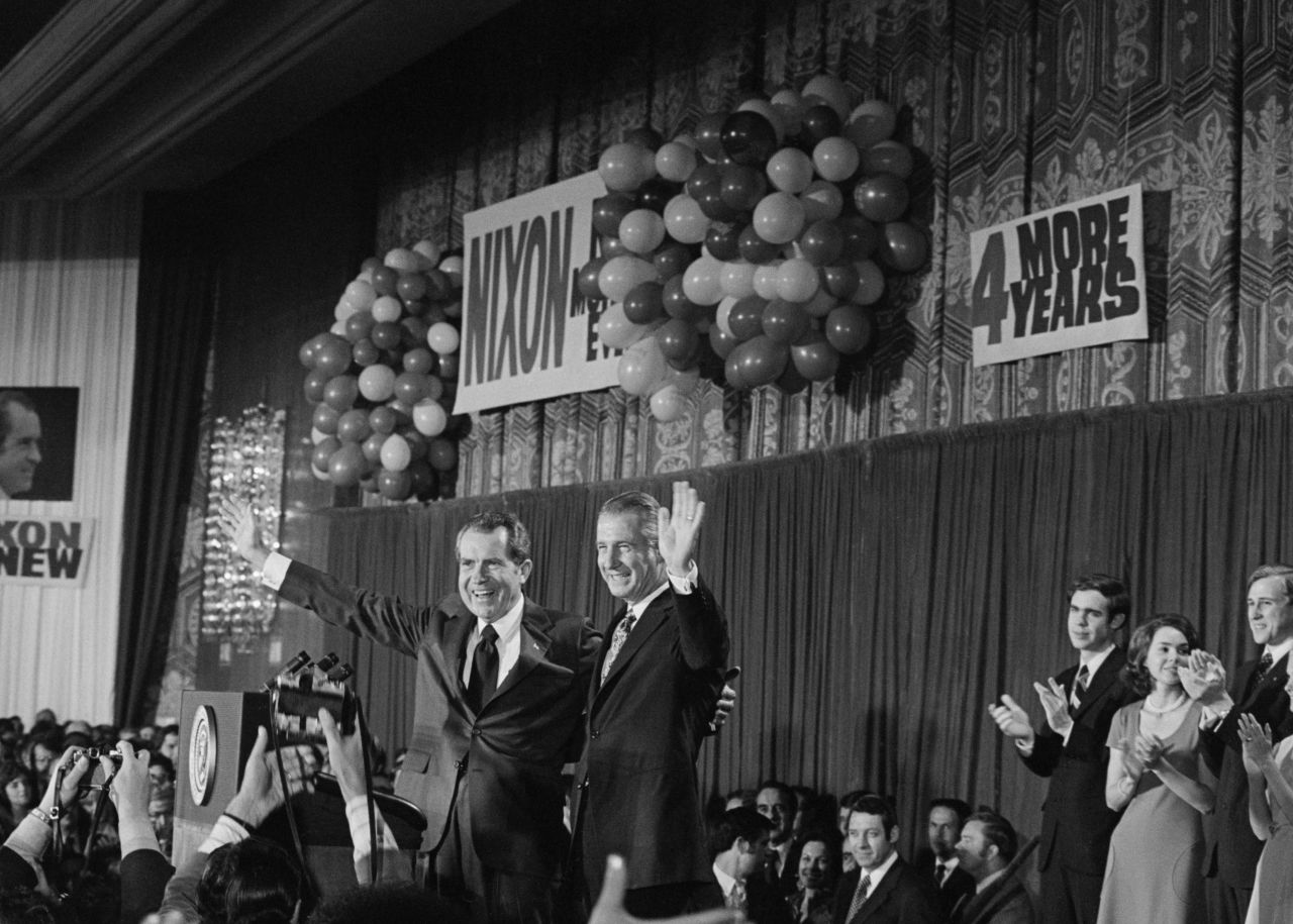 Nixon celebrates with Vice President Spiro Agnew after defeating Democratic challenger George McGovern to win reelection in November 1972.