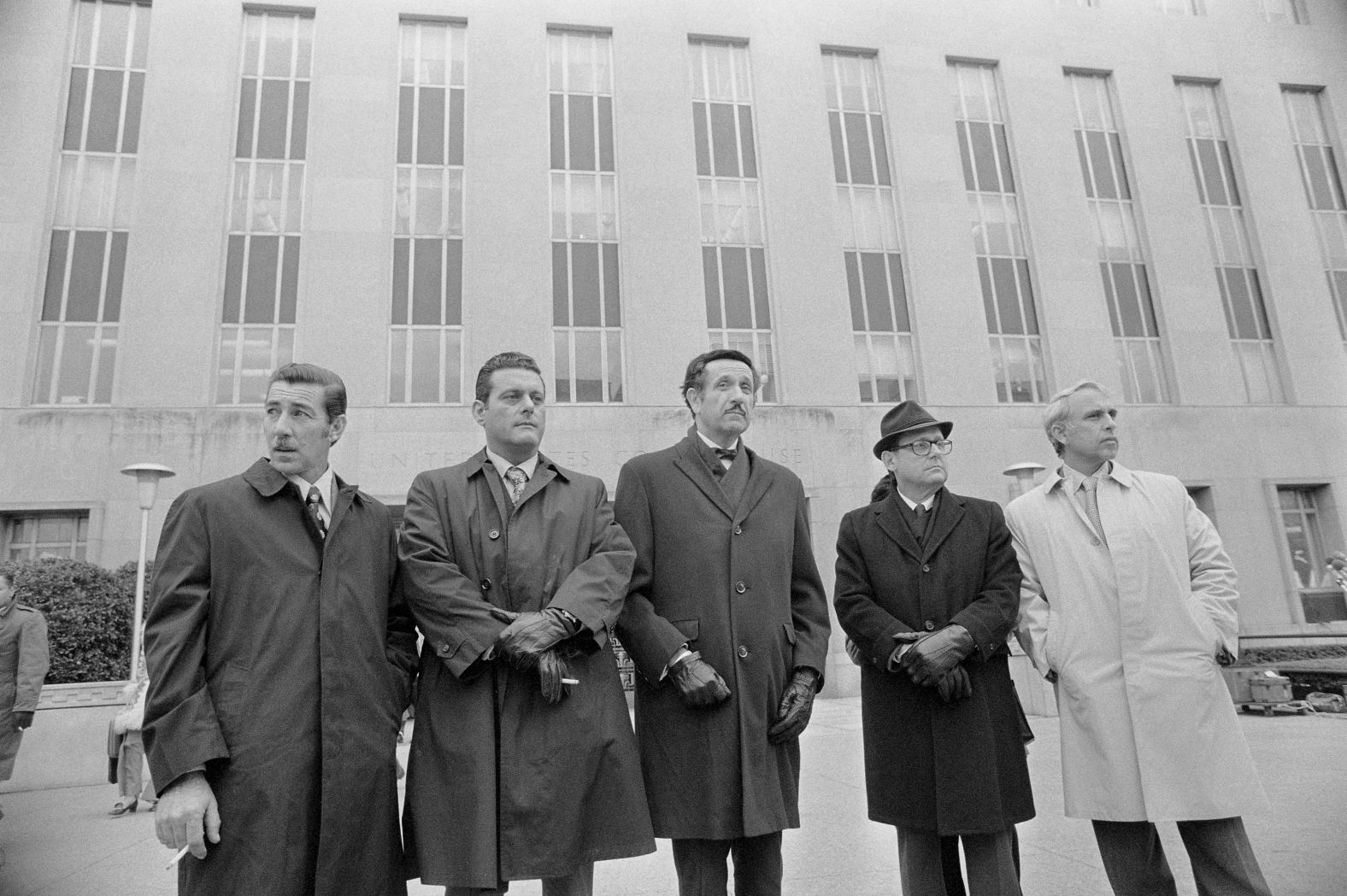 Some of the Watergate burglary suspects stand with their attorney in January 1973. From left are Gonzalez, Sturgis, attorney Henry Rothblatt, Barker and Martinez. Later that month, these suspects pleaded guilty to conspiracy and other charges. Hunt would also plead guilty, while McCord and Liddy were convicted.
