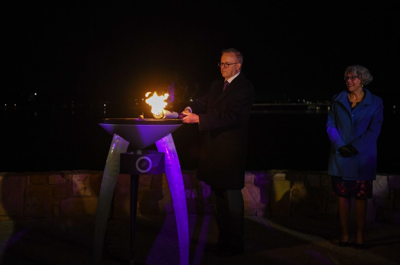 Australian Prime Minister Anthony Albanese lights the Commonwealth Beacon for a jubilee celebration in Canberra, Australia, on Thursday.