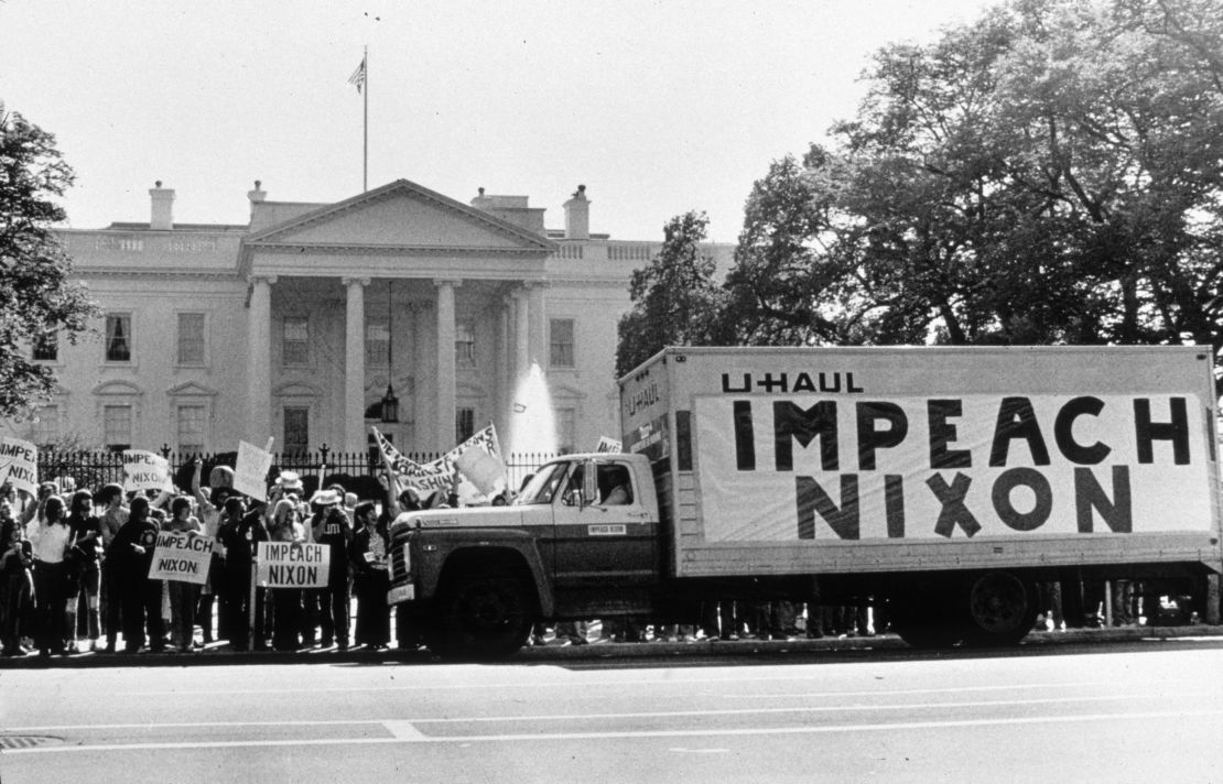 A demonstration outside the Whitehouse in support of impeaching Nixon following the Watergate revelations.   