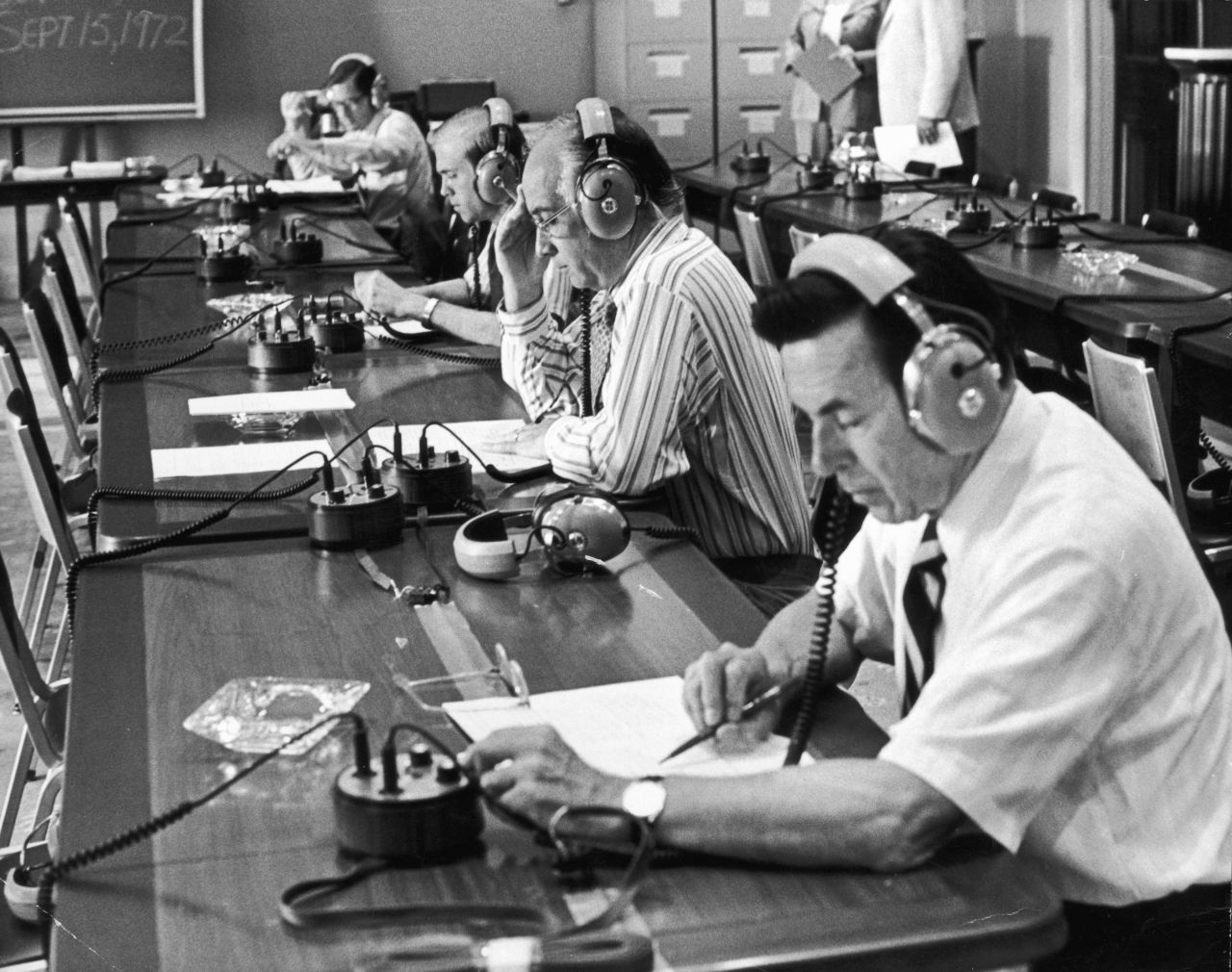 US Reps. Edward Boland, right, and Jack Edwards, second from right, are seen here listening to some of the presidential tapes on August 6, 1974. The tapes revealed a conversation from June 23, 1972, that proved Nixon had knowledge of the cover-up from the beginning.