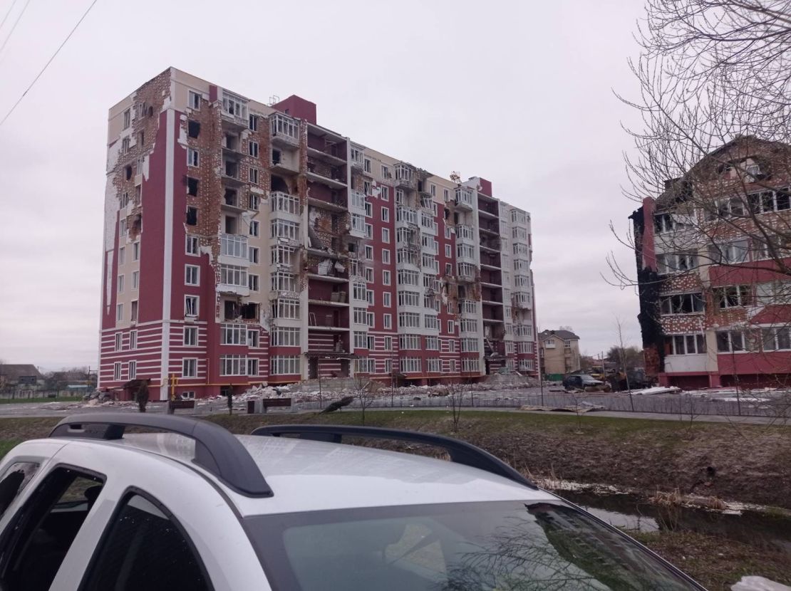 The white car in which the mayor was traveling is seen abandoned near the Pokrovsky residential complex.
