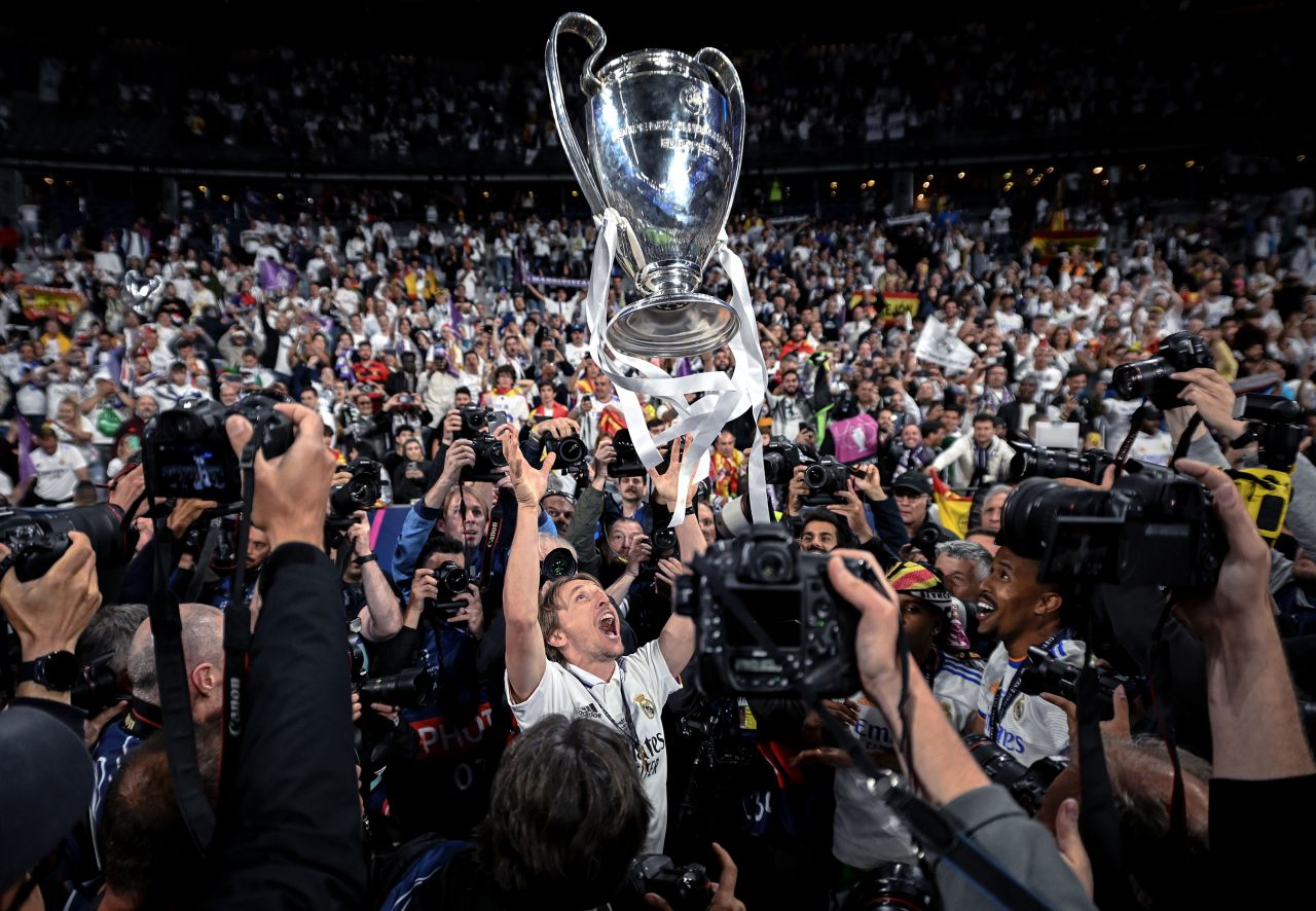 Real Madrid star Luka Modric celebrates with the trophy after <a href="https://www.cnn.com/2022/05/28/football/champions-league-final-liverpool-real-madrid-spt-intl/index.html" target="_blank">his team defeated Liverpool</a> in the Champions League final on Saturday, May 28. It was Real's 14th European crown.