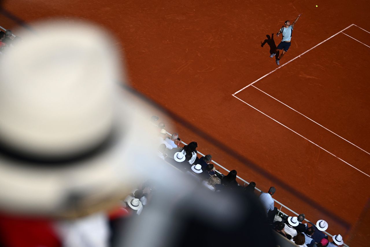 Carlos Alcaraz serves the ball to Alexander Zverev during a French Open quarterfinal match in Paris on Tuesday, May 31.