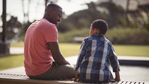 Fathers can be role models to their sons by showing them how to talk about their feelings.