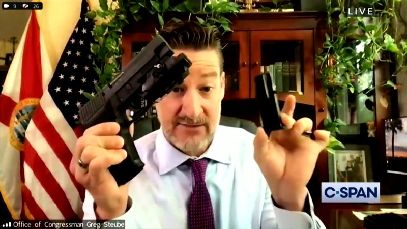 Lawmaker pulls out weapons on webcam: ‘I can do whatever I want with my guns’