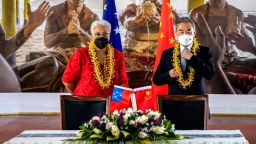 Chinese Foreign Minister Wang Yi and Samoa Prime Minister Fiame Naomi Mata'afa at an agreements signing ceremony in Apia last month.