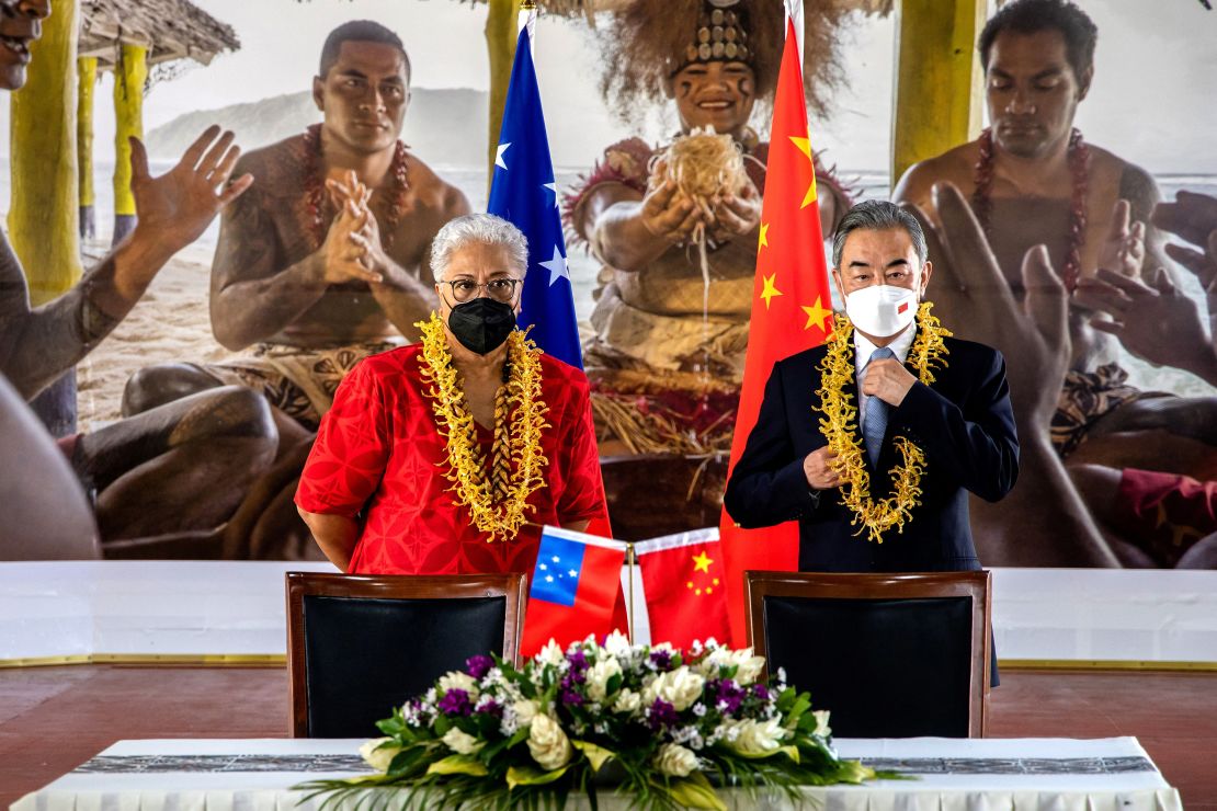 Chinese Foreign Minister Wang Yi and Samoa Prime Minister Fiame Naomi Mata'afa attend an agreement signing ceremony in Apia. 
