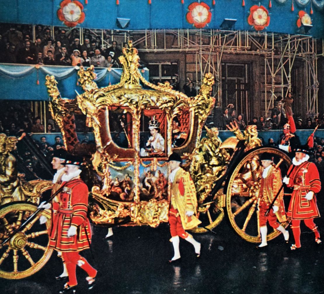 Queen Elizabeth II in the coach during her coronation in 1953. 