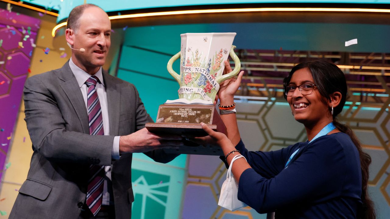 Harini Logan, 14, from San Antonio, Texas, receives the trophy after winning the annual Scripps National Spelling Bee held at National Harbor in Oxon Hill, Maryland, U.S., June 2, 2022. REUTERS/Jonathan Ernst