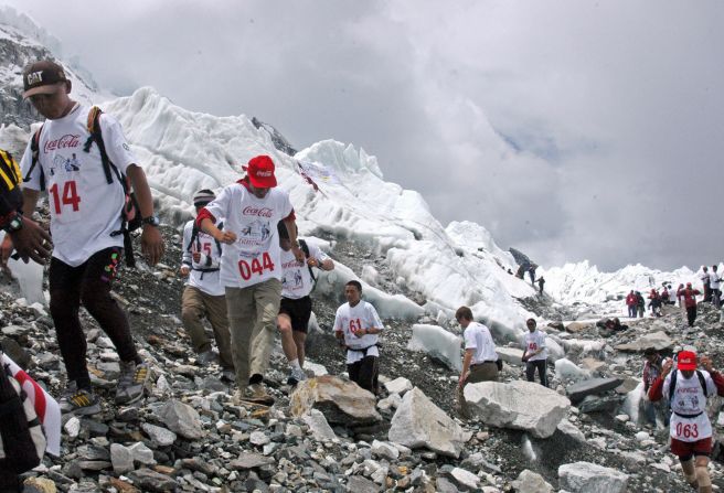 <strong>Everest: </strong>It's hard to imagine climbing Mount Everest -- let alone running it. But that's what hundreds of marathon runners have been doing each year since 2003. Pictured: runners compete in the Everest Hillary Marathon across Everest's Base Camp, in 2006.