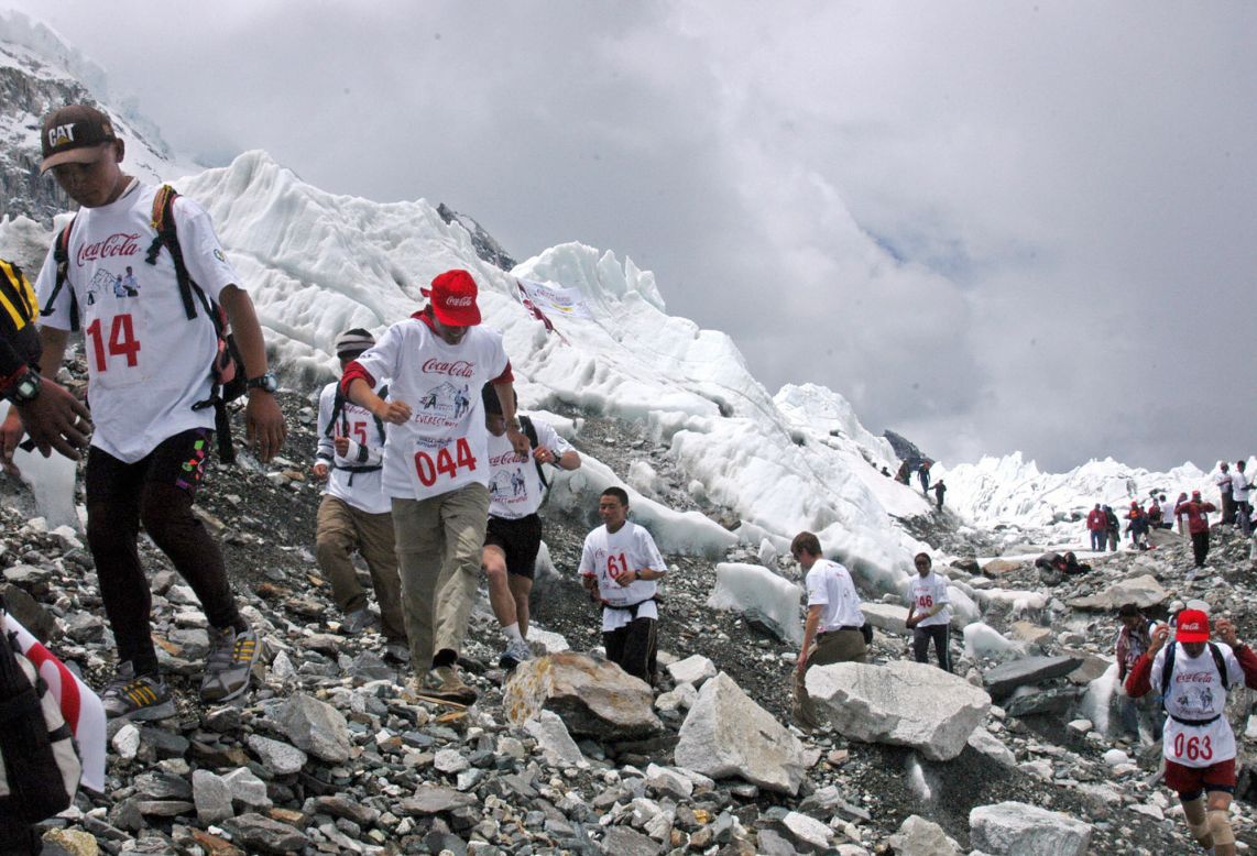 <strong>Everest: </strong>It's hard to imagine climbing Mount Everest -- let alone running it. But that's what hundreds of marathon runners have been doing each year since 2003. Pictured: runners compete in the Everest Hillary Marathon across Everest's Base Camp, in 2006.