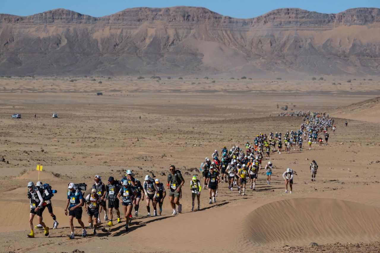 <strong>Morocco:</strong> From the snow to the sand, the Marathon des Sables in Morocco's Sahara Desert is a grueling race against the heat. Here, runners take part in the third stage in March 2022.