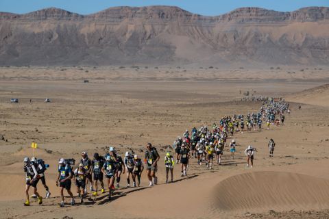 <strong>Morocco:</strong> From the snow to the sand, the Marathon des Sables in Morocco's Sahara Desert is a grueling race against the heat. Here, runners take part in the third stage in March 2022.