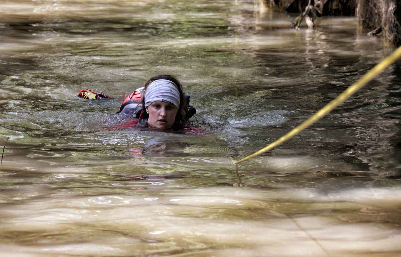 <strong>The Amazon: </strong>The terrain of the jungle also calls for the occasional water crossing. Pictured: Great Britain's Amy Gasson swims across a river during the ultramarathon in 2014.