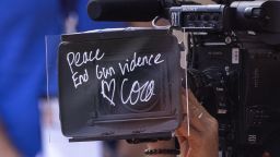 PARIS, FRANCE JUNE 2.  Coco Gauff of the United States writes her message on the camera "Peace end gun violence love Coco" after her victory against Martina Trevisan of Italy during the Singles Semi-Final match on Court Philippe Chatrier at the 2022 French Open Tennis Tournament at Roland Garros on June 2nd 2022 in Paris, France. (Photo by Tim Clayton/Corbis via Getty Images)