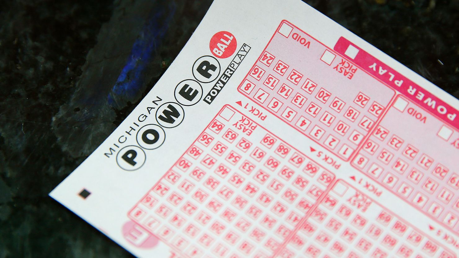 A Michigan woman parlayed free lottery tickets into a $100,000 win.