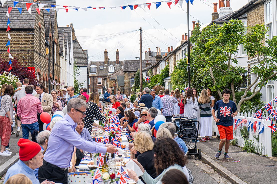 Residents in Wimbledon village, southwest London, hold a jubilee street party -- one of thousands to be held by communities across London and the United Kingdom over the weekend.