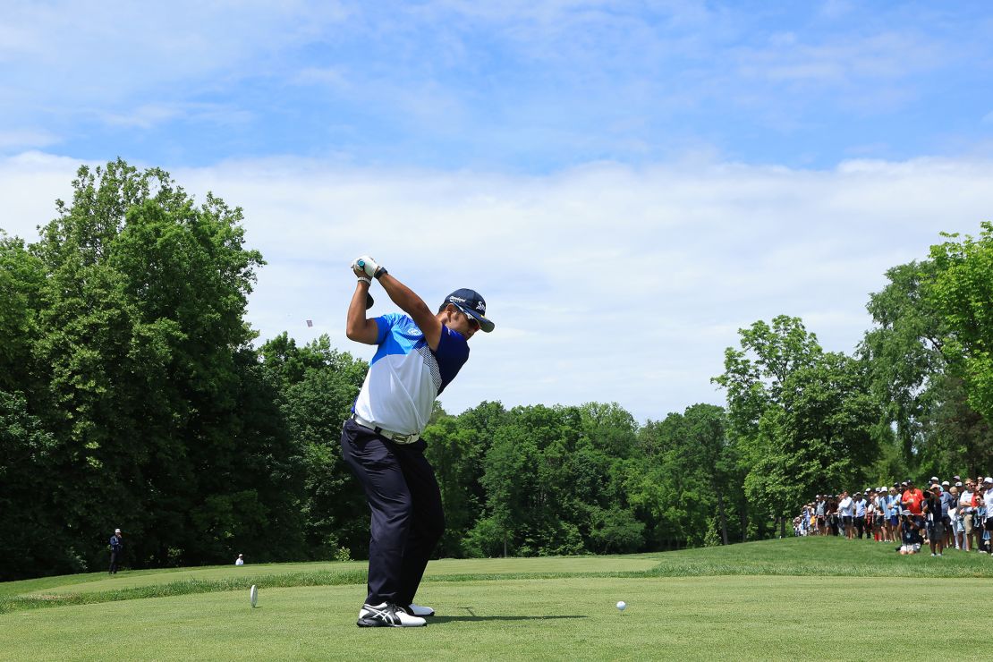 Matsuyama plays a shot on the fifth hole.