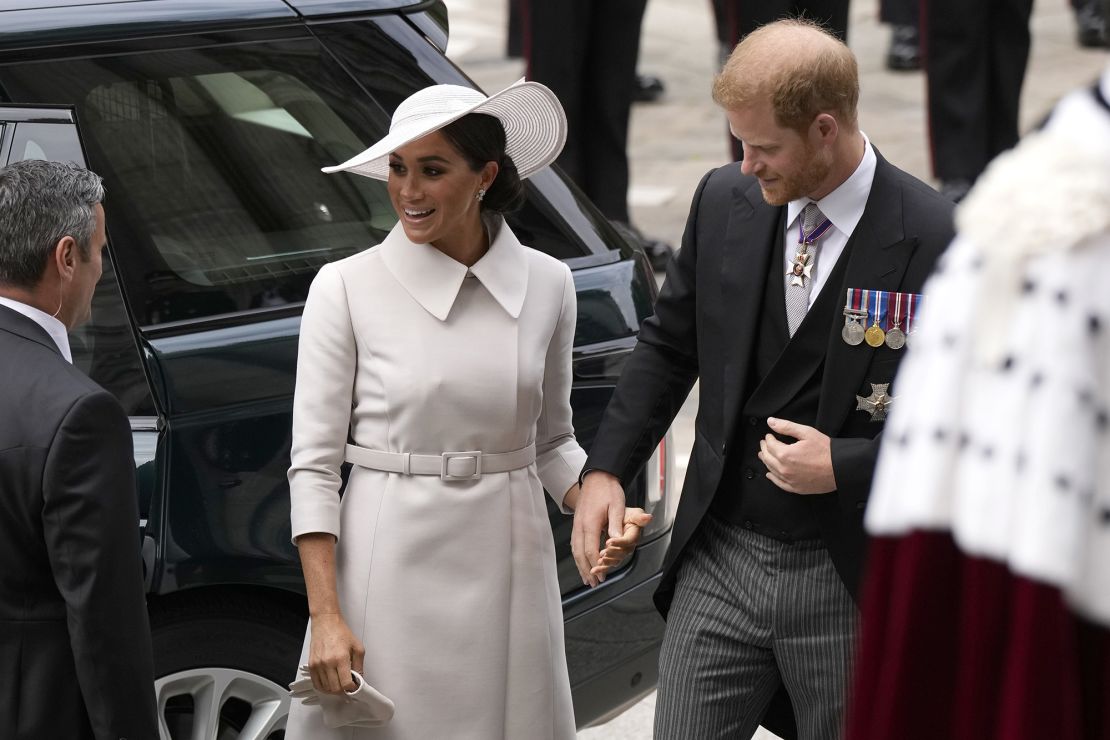 Prince Harry and Meghan, Duchess of Sussex arrive at the service of thanksgiving on Friday.
