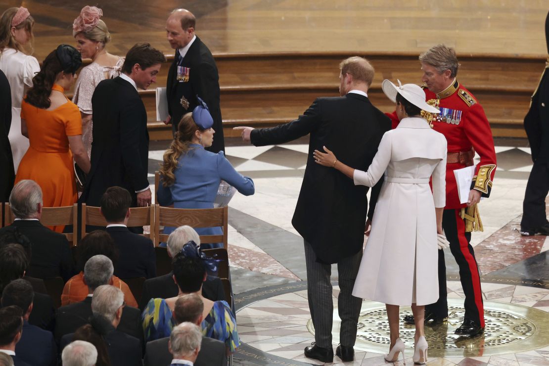 The couple take their seats within St Paul's.