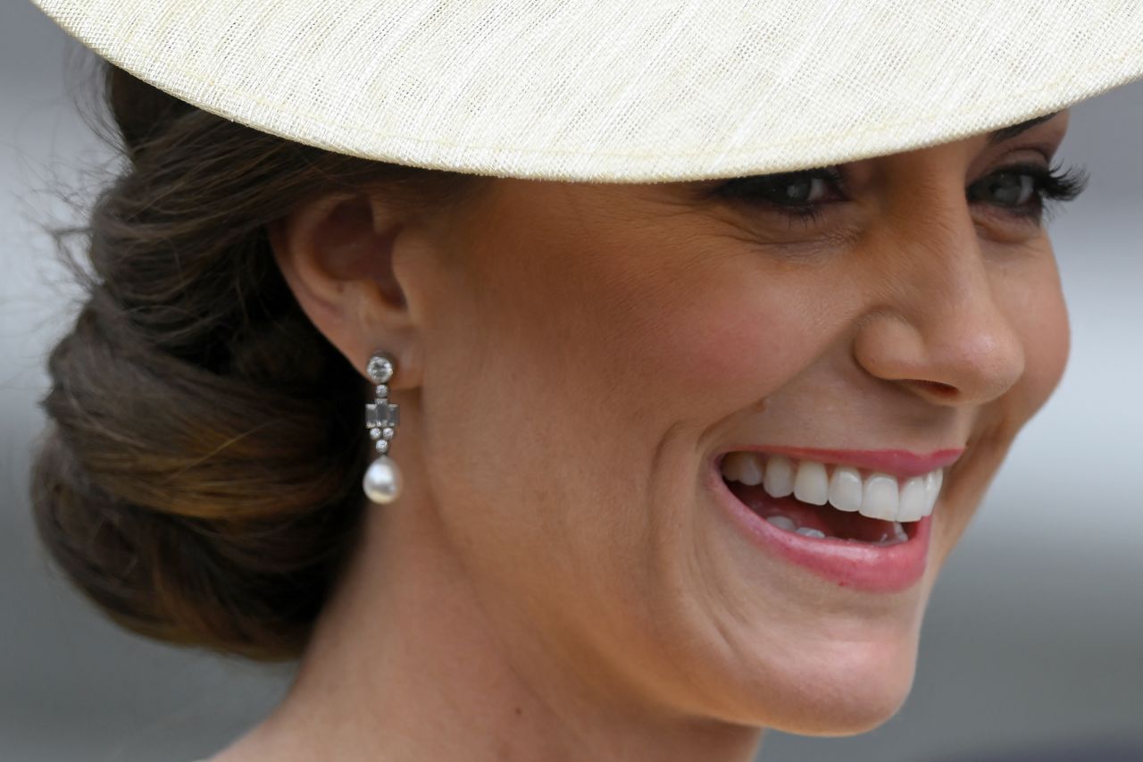 Catherine, the Duchess of Cambridge, smiles as she arrives at St Paul's Cathedral on Friday.