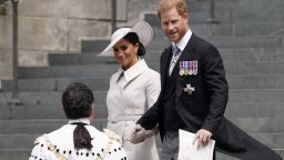 Prince Harry and his wife Meghan, Duchess of Sussex, depart after attending a service of thanksgiving for the reign of Queen Elizabeth II at St Paul's Cathedral in London, Friday, June 3, 2022.