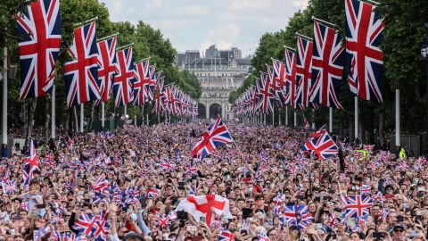 Crowds fill The Mall as they wait for the royal family to appear on the balcony of Buckingham Palace on the first day of celebrations for the Queen's Platinum Jubilee on Thursday.