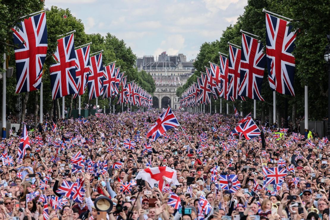 Crowds fill The Mall as they wait for the royal family to appear on the balcony of Buckingham Palace on the first day of celebrations for the Queen's Platinum Jubilee on Thursday.