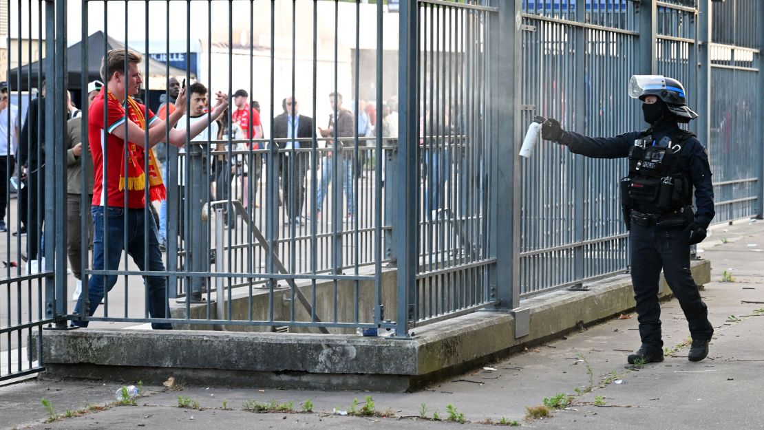 Police spray tear gas at Liverpool fans outside the stadium prior to the Champions League Final.