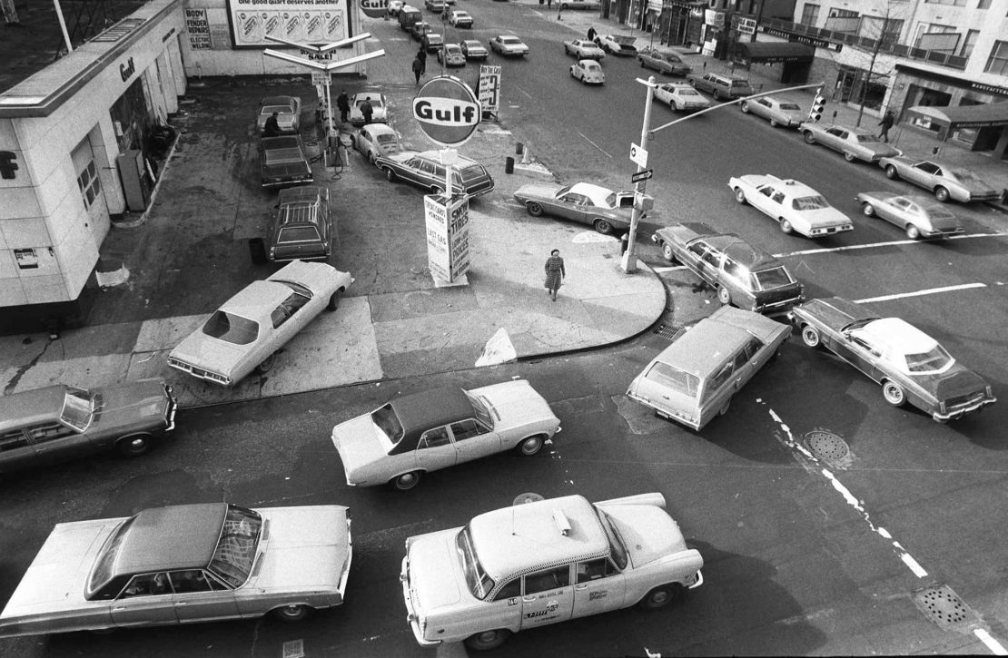 Cars line up in two directions at a gas station in New York City in 1973. As gas sprices spiked during the 1970s, restrooms fell off.
