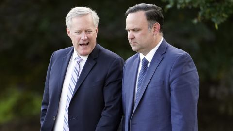 White House chief of staff Mark Meadows and White House social media director Dan Scavino walk to board Marine One on the South Lawn of the White House, September 22, 2020.