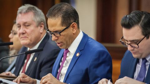 Fernando Cabrera, center, is seen divestment from nuclear weapons at City Hall in New York City on January 28, 2020.