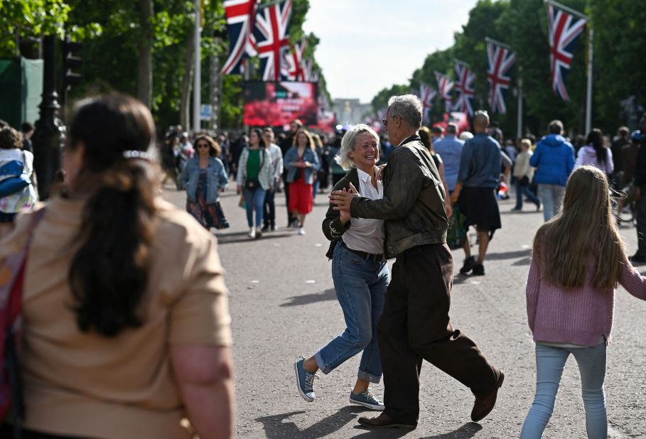 People dance during jubilee celebrations in London on Saturday. 