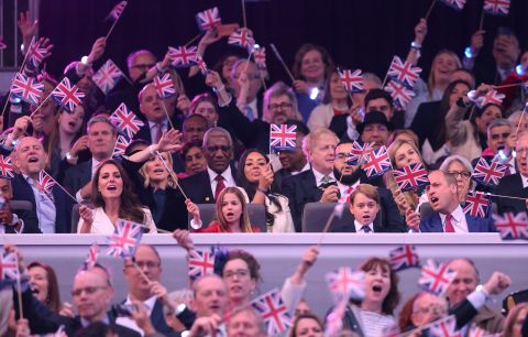 Members of the royal family attend Saturday night's concert. In the center row, from left, are Catherine, the Duchess of Cambridge; Princess Charlotte; Prince George; and Prince William.