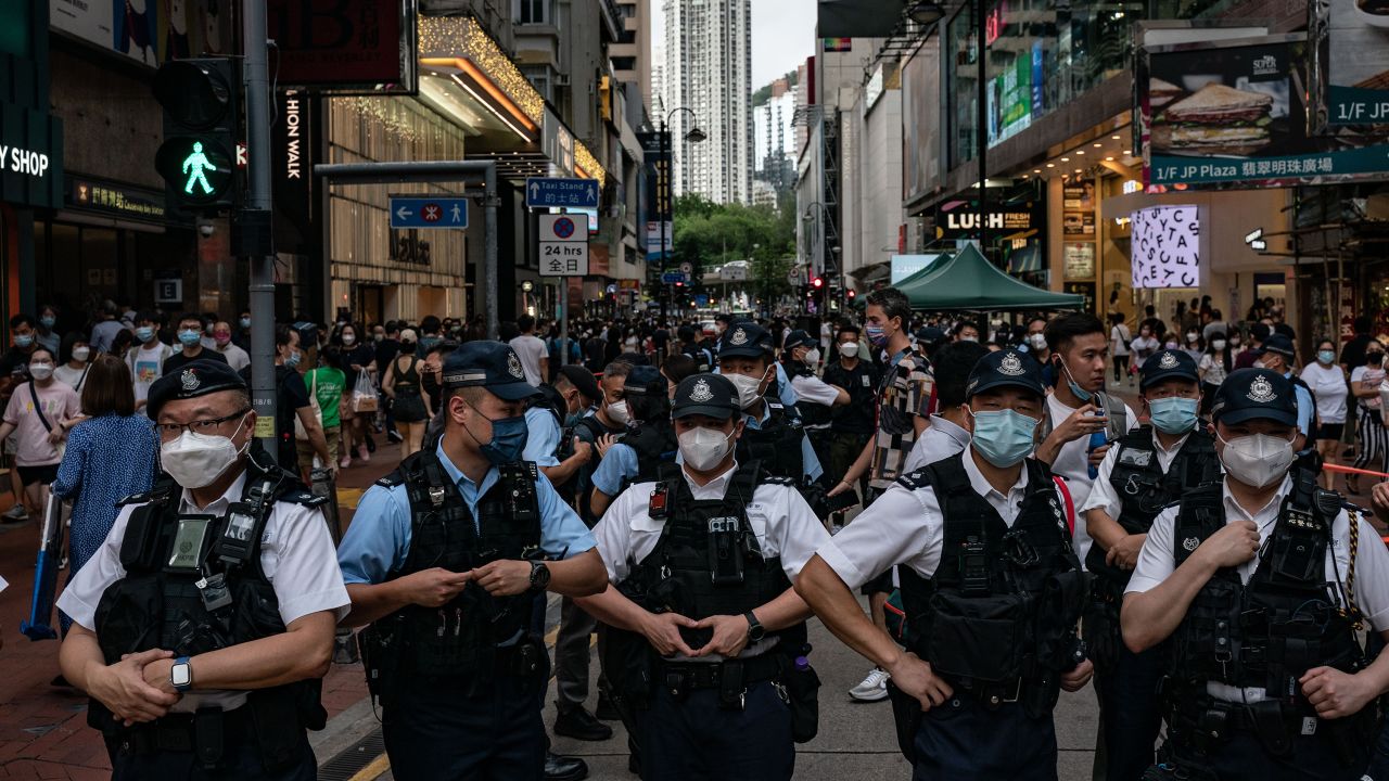 Police officers  near Victoria Park, the traditional site of the annual Tiananmen candlelight vigil, on June 4 in Hong Kong.